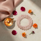 Rose Quartz Band with diya and petals — ritual flat-lay | Salico
