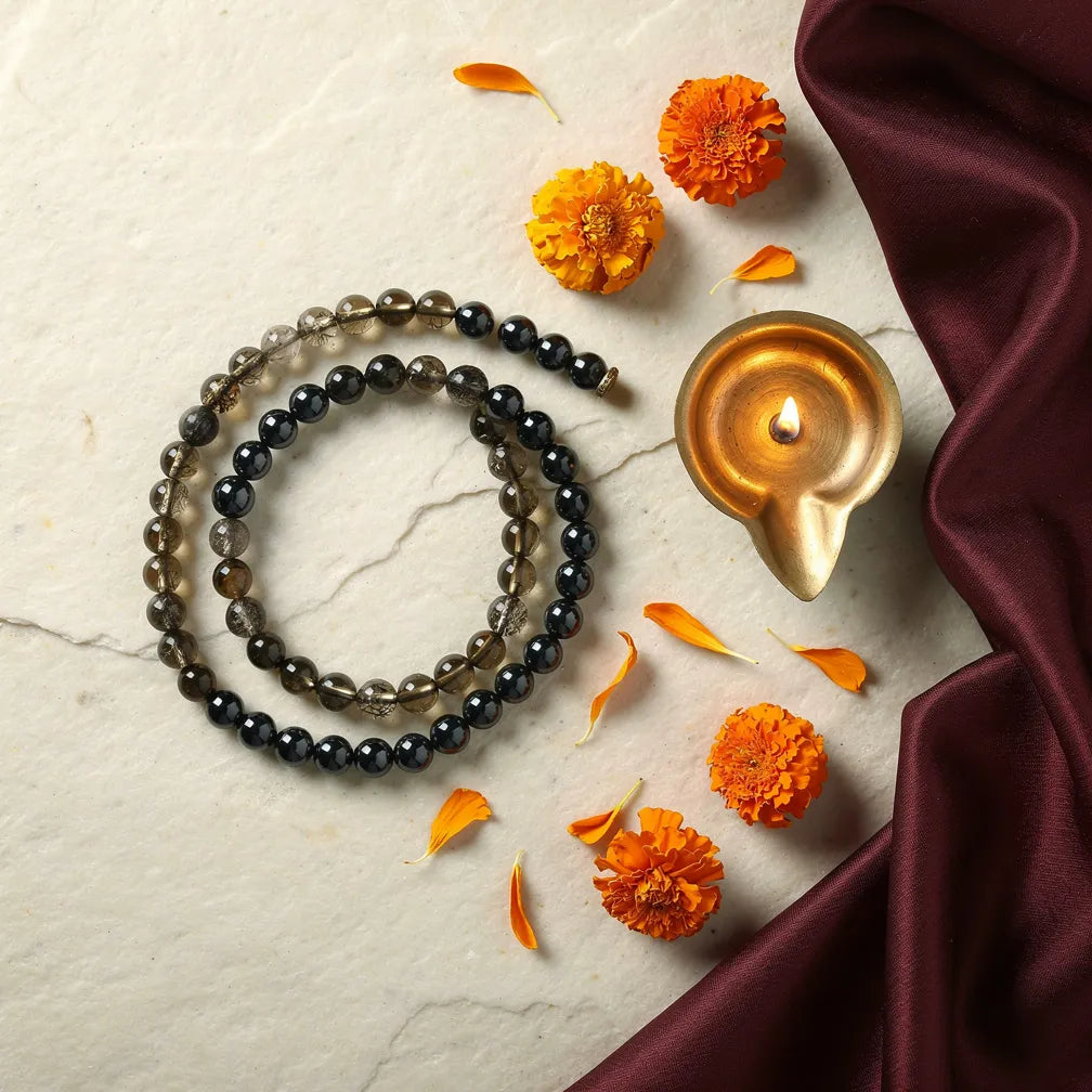Makar Rashi Band with diya — ritual flat-lay | Salico