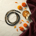 Makar Rashi Band with diya — ritual flat-lay | Salico