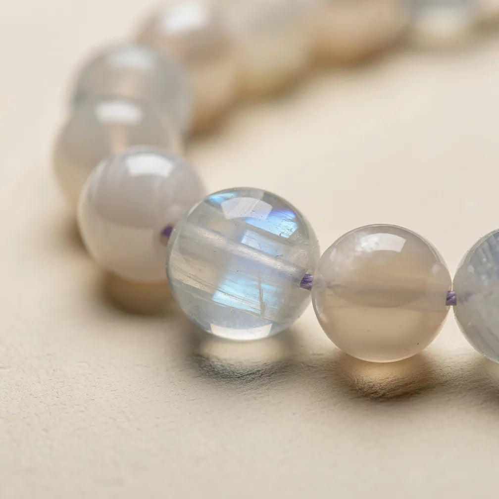 Moonstone and pearl shell texture close-up | Salico