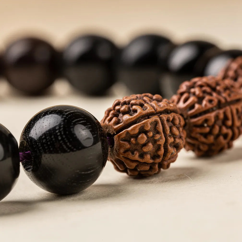 Ebony and rudraksha bead texture contrast close-up | Salico