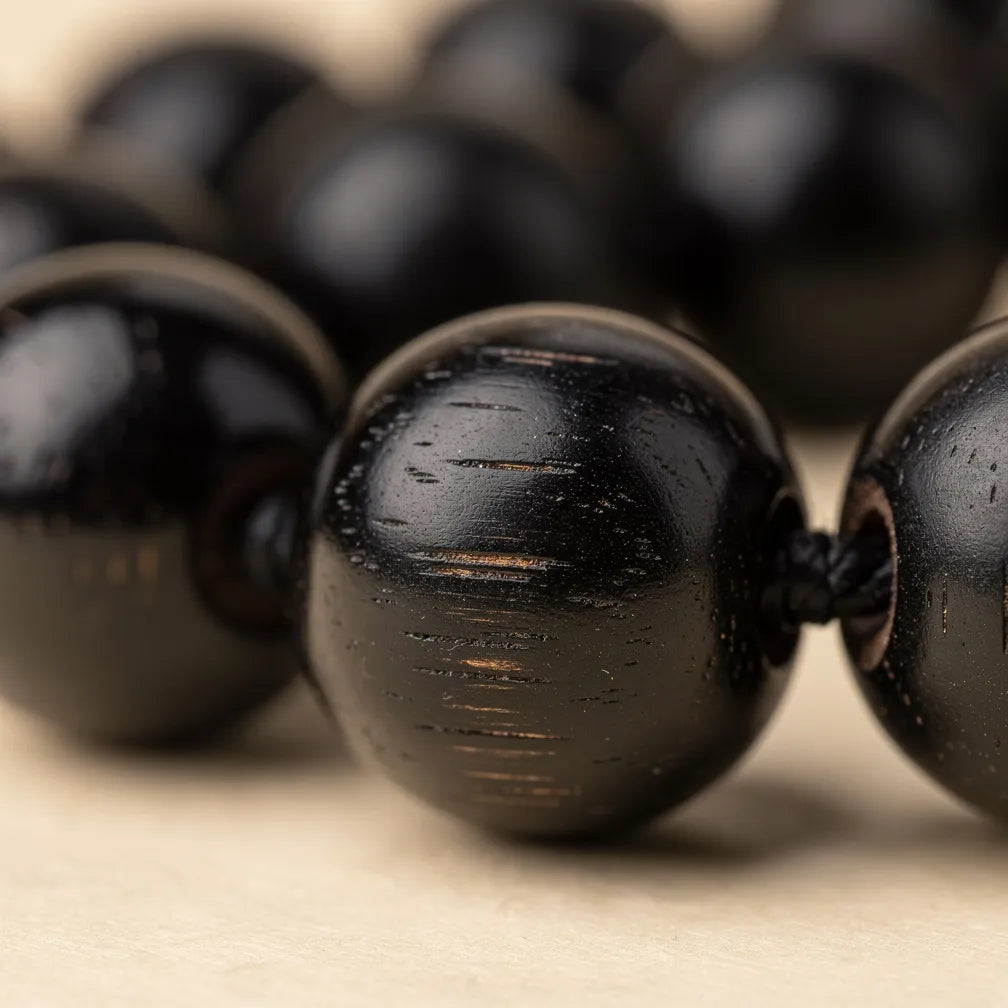Karungali ebony bead and knotting close-up | Salico