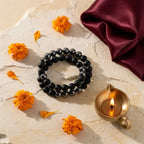 Grounding Band with diya and marigold — ritual flat-lay | Salico