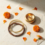 Slim Rudraksha Bracelet with diya — ritual flat-lay | Salico