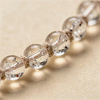 Clear quartz bead and knotting close-up | Salico