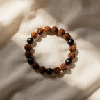 Nazar Raksha Band rudraksha and black onyx — hero product shot | Salico