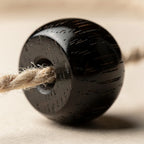 Ebony barrel bead grain close-up | Salico