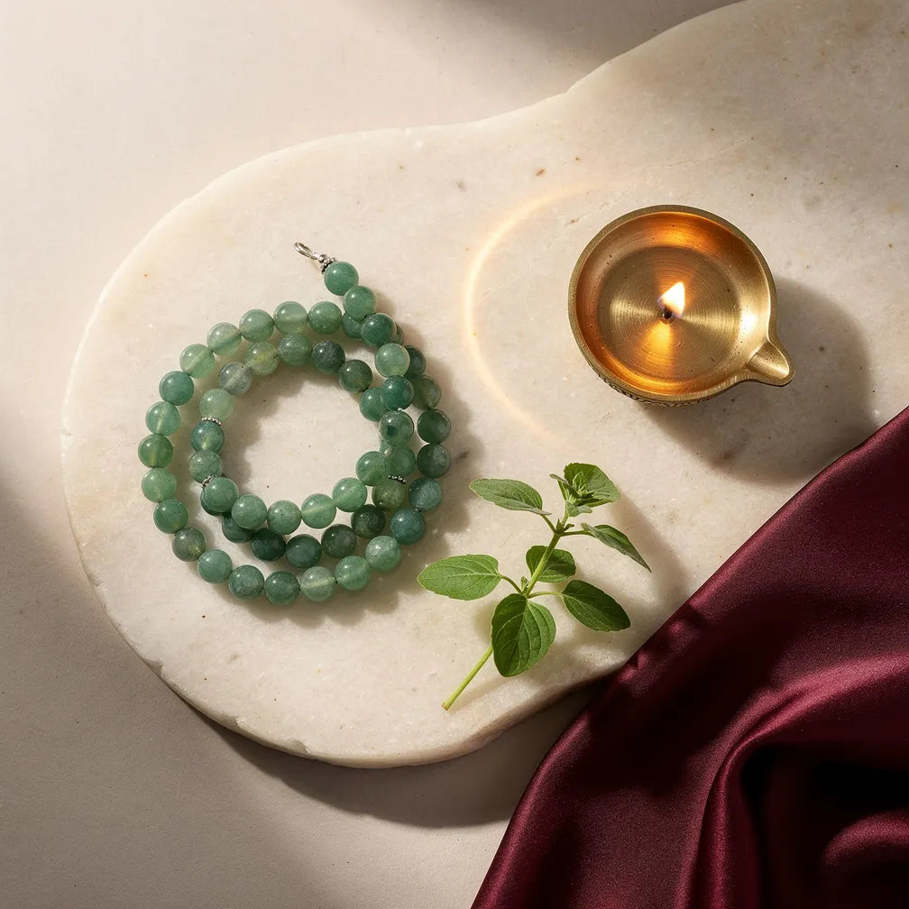 Green Aventurine Band with diya and tulsi — ritual flat-lay | Salico
