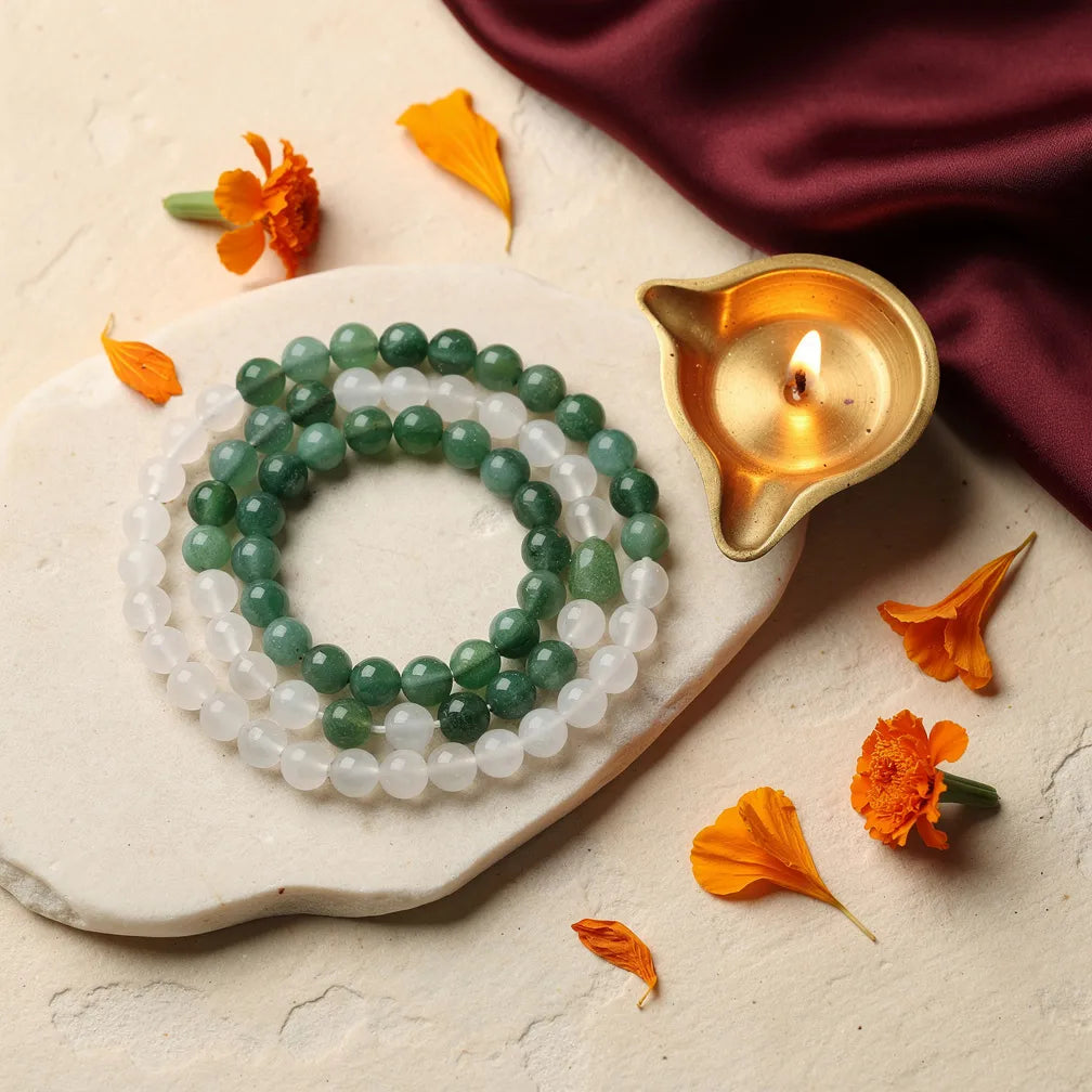 Mithun Rashi Band with diya — ritual flat-lay | Salico